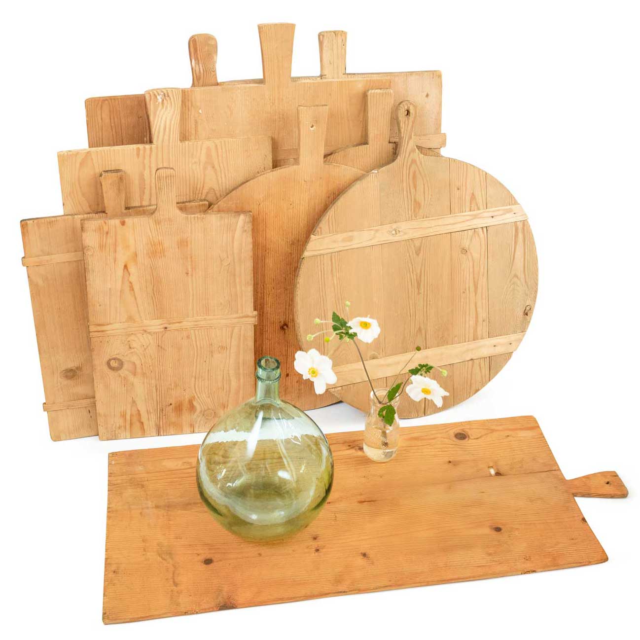 Set of wooden cutting boards with handles on a white background