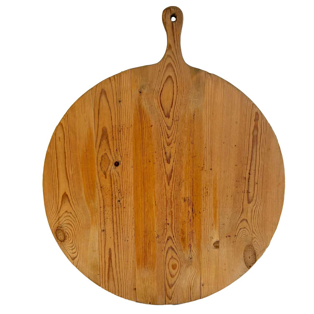 Round wooden cutting board with a handle on a white background