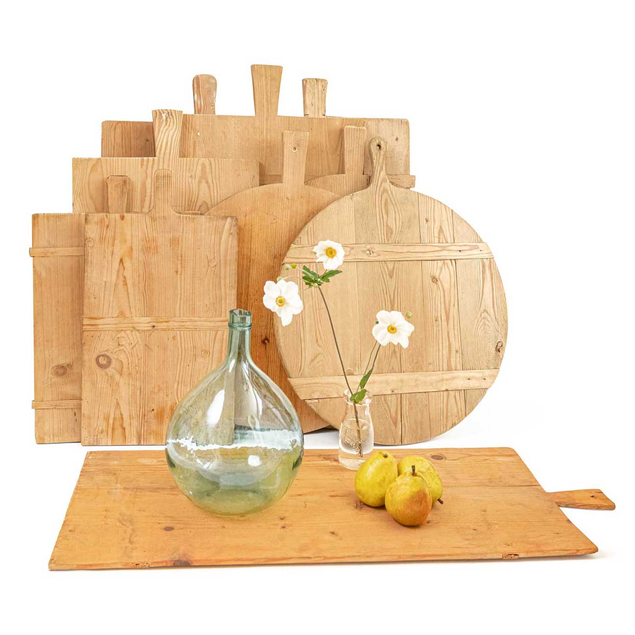 Rustic cutting boards with a clear bottle in the front