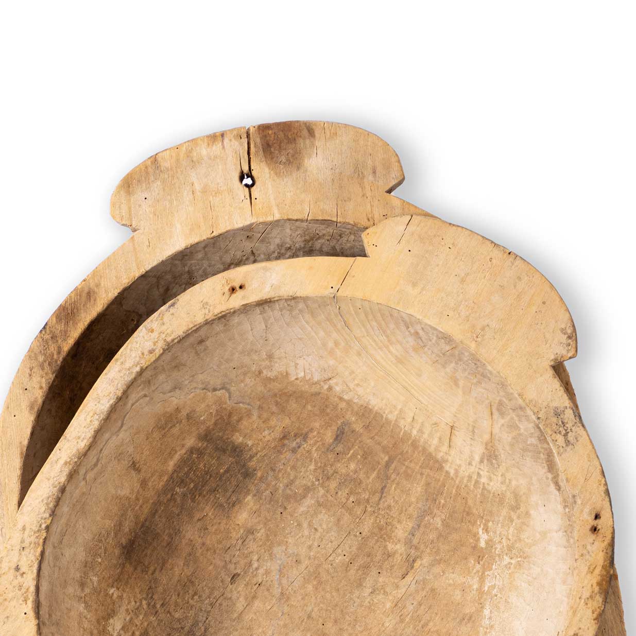 Two wooden bowls of different sizes on a white background