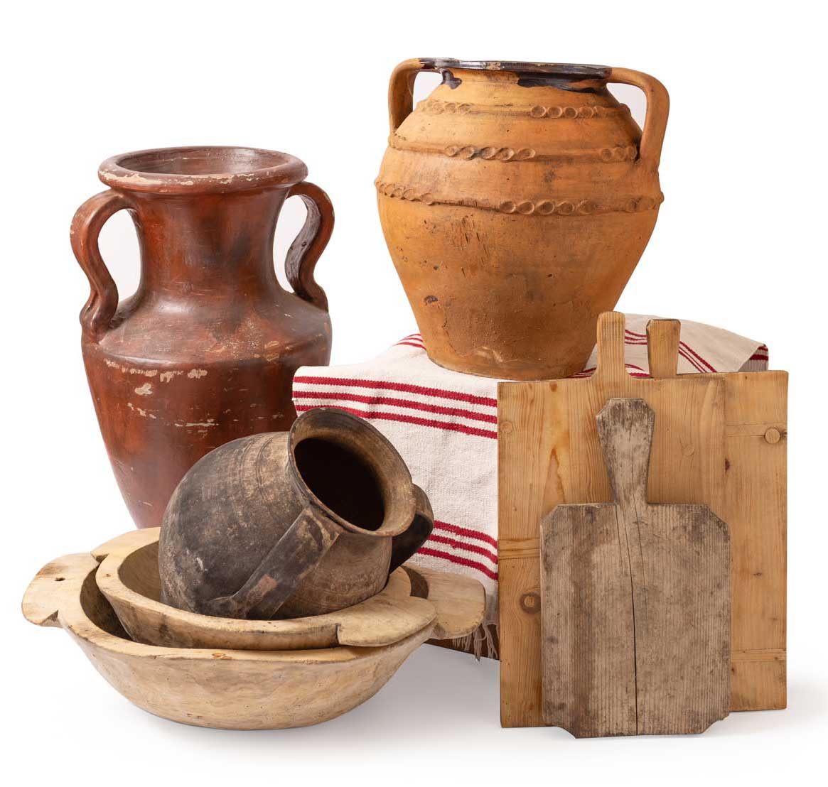 Collection of rustic wooden and ceramic kitchenware items on a white background